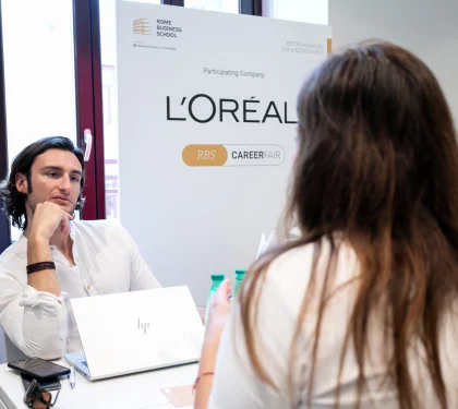 media master student networking with loreal representative