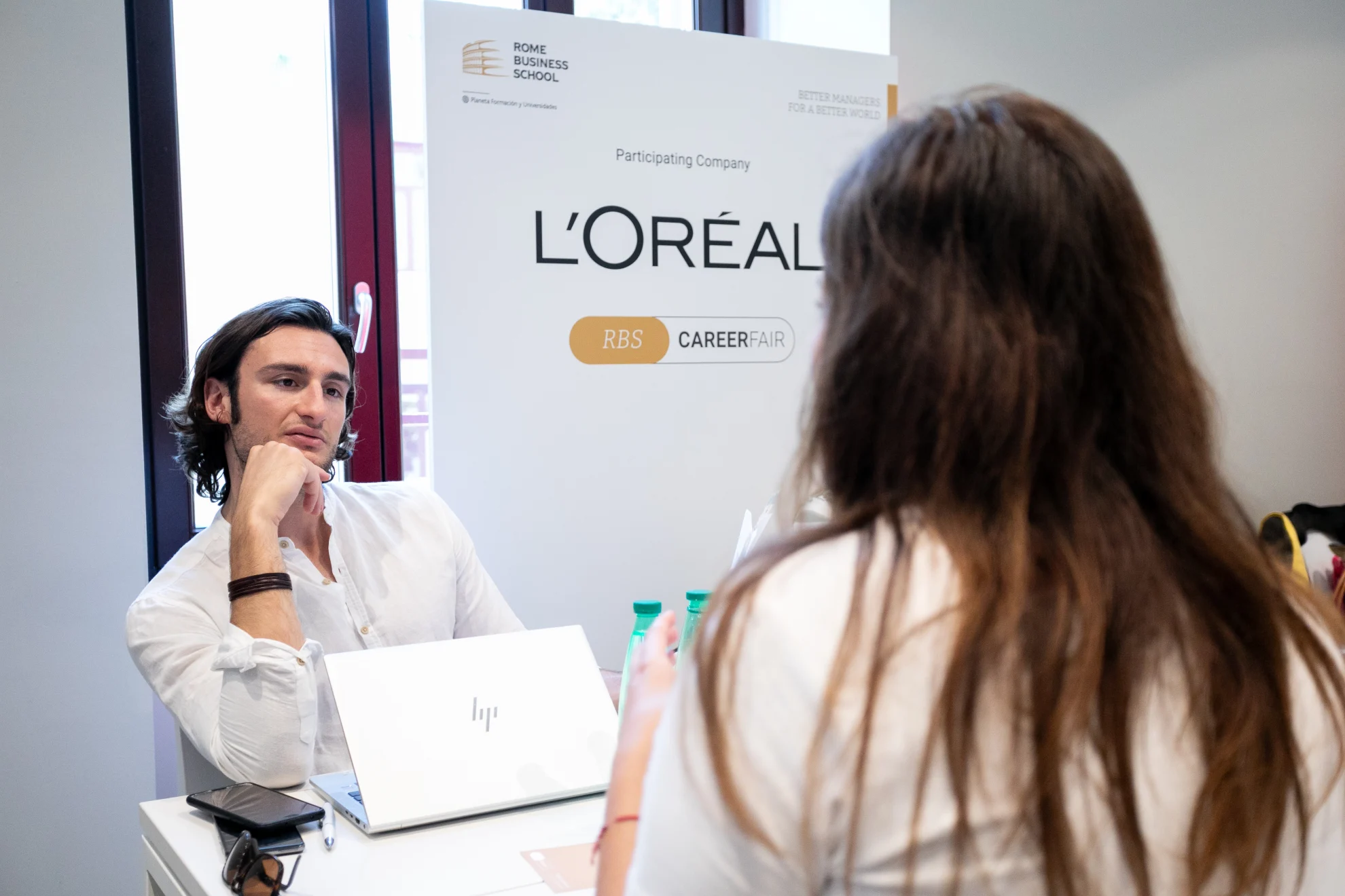 media master student networking with loreal representative